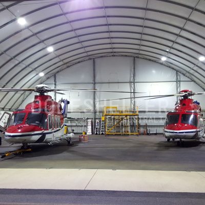 DomeShelter used to store a helicopter with expanded blades.