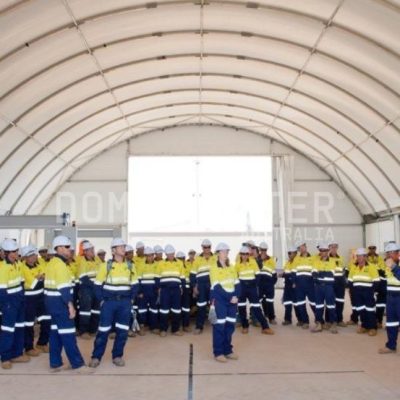 Staff assembly underneath a DomeShelter dome.