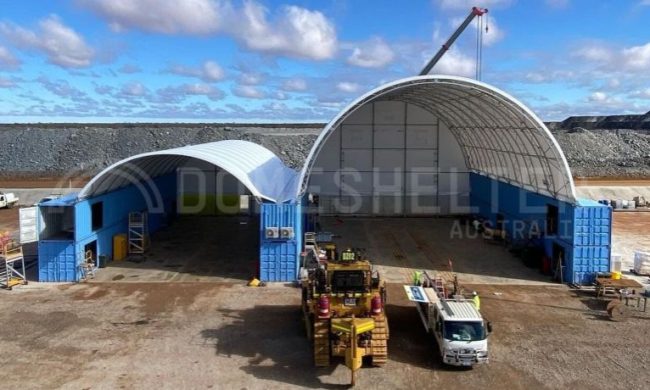 Two interconnected, different sized Container Dome Fabric Structures