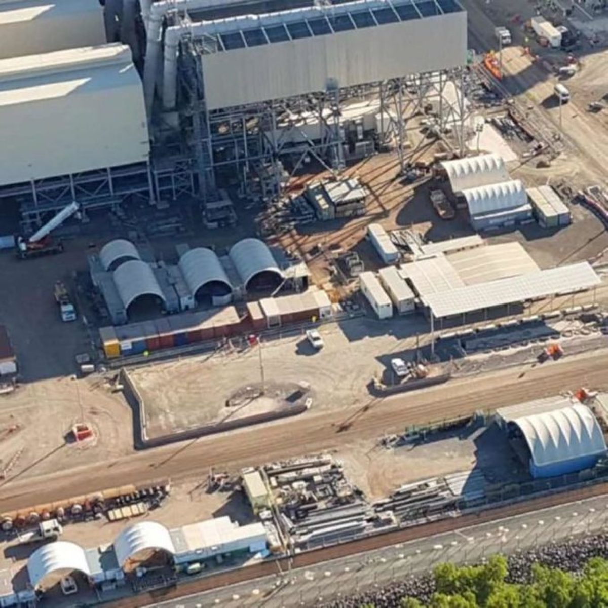 aerial view of several dome fabric structures in an industrial setting