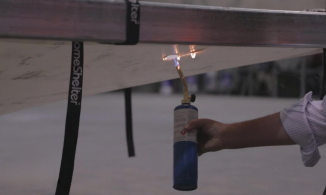 Image of flame retardant demo on domeshelter tarp